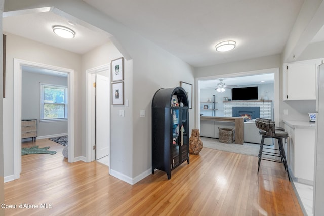 1623 E Boyd Ave, Coeur Dalene, ID 83814 - corridor featuring light wood finished floors and baseboards