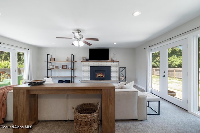 1623 E Boyd Ave, Coeur Dalene, ID 83814 - living room with french doors, healthy amount of natural light, carpet flooring, and recessed lighting