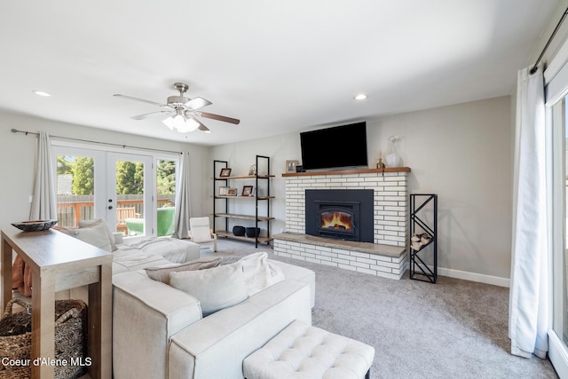 1623 E Boyd Ave, Coeur Dalene, ID 83814 - carpeted living area featuring a ceiling fan, a fireplace, french doors, and recessed lighting