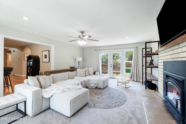 1623 E Boyd Ave, Coeur Dalene, ID 83814 - living room with ceiling fan, recessed lighting, a brick fireplace, and arched walkways