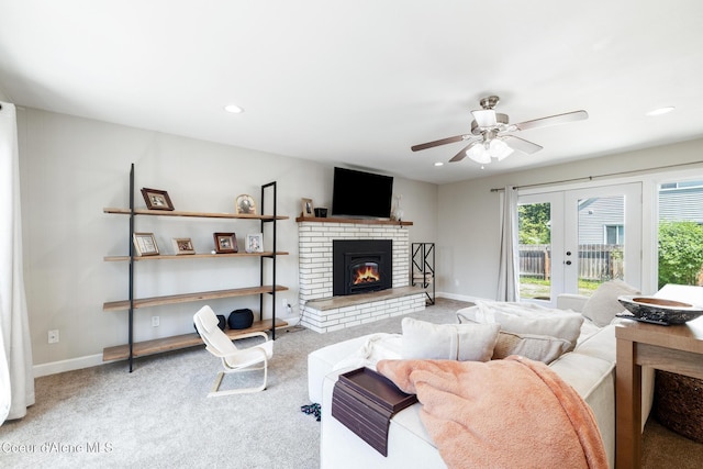 1623 E Boyd Ave, Coeur Dalene, ID 83814 - living room featuring a ceiling fan, a fireplace, carpet, french doors, and recessed lighting