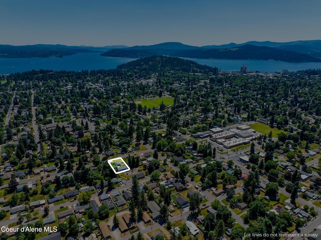 1623 E Boyd Ave, Coeur Dalene, ID 83814 - aerial overview of property's location featuring property parcel outlined and a water and mountain view