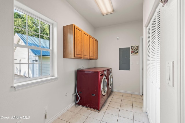 182 Sunnyside Rd, Sandpoint, ID 83864 - laundry area featuring electric panel, cabinet space, independent washer and dryer, and light tile patterned floors