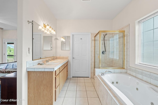 182 Sunnyside Rd, Sandpoint, ID 83864 - bathroom featuring a whirlpool tub, vanity, a stall shower, and tile patterned floors