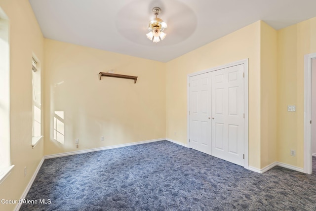 182 Sunnyside Rd, Sandpoint, ID 83864 - unfurnished bedroom featuring carpet flooring, a closet, and ceiling fan