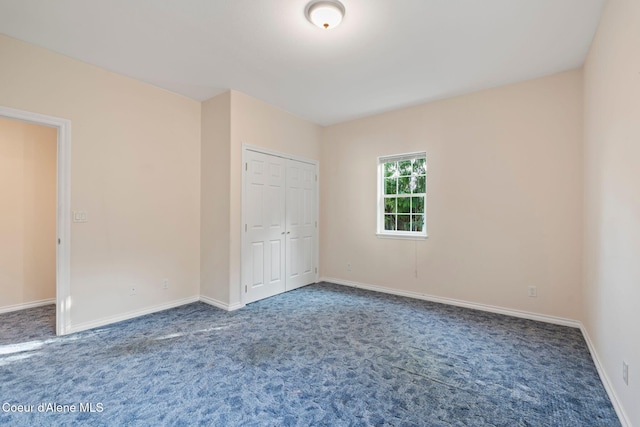 182 Sunnyside Rd, Sandpoint, ID 83864 - unfurnished bedroom with carpet flooring and a closet
