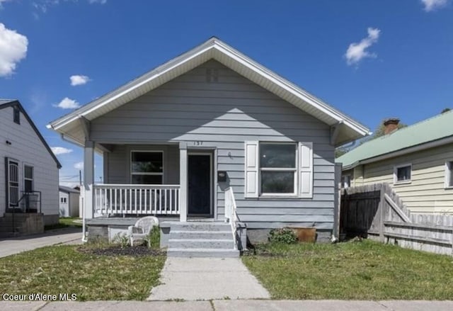 137 3rd St, Idaho Falls, ID 83401 - view of front facade with a porch