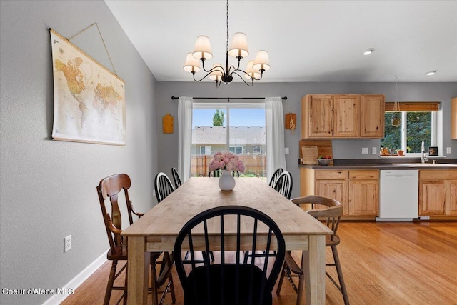 2682 W Iago St, Post Falls, ID 83854 - dining area featuring light wood finished floors, a chandelier, healthy amount of natural light, and recessed lighting