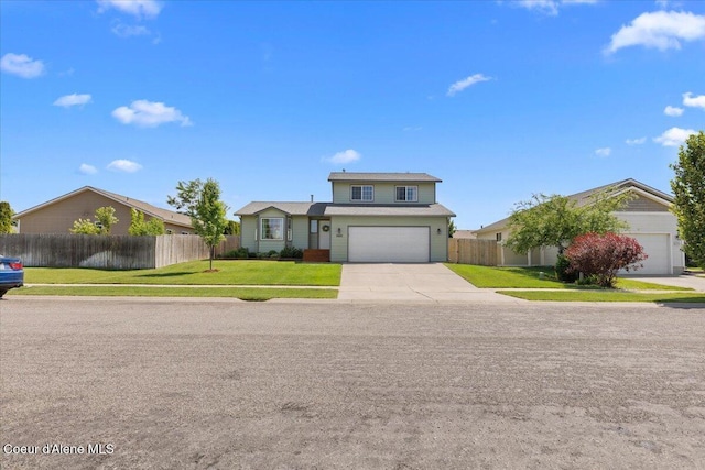 2682 W Iago St, Post Falls, ID 83854 - traditional-style home with concrete driveway and a garage