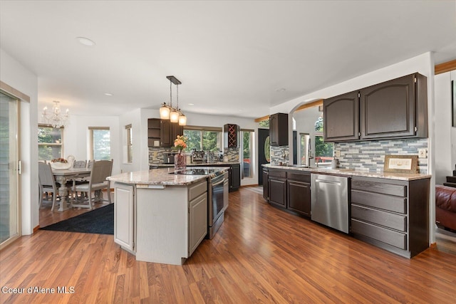 299 Oak Ter, Cocolalla, ID 83813 - kitchen featuring stainless steel appliances, backsplash, a chandelier, dark wood finished floors, and recessed lighting