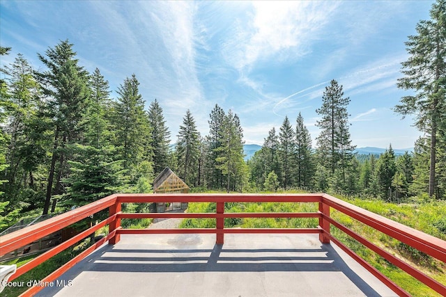299 Oak Ter, Cocolalla, ID 83813 - wooden deck featuring a view of trees