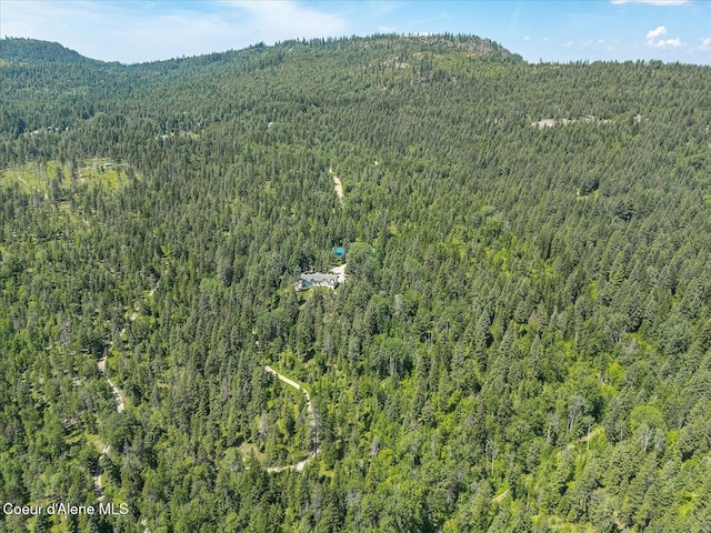 299 Oak Ter, Cocolalla, ID 83813 - aerial view of property's location featuring a forest and a mountainous background