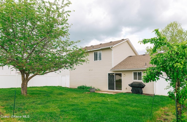 3619 W Manning Loop, Coeur Dalene, ID 83815 - rear view of property with a shingled roof