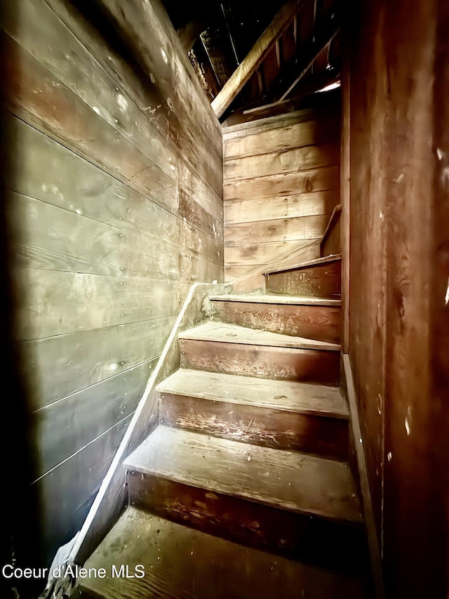 408 High Bank St, Wallace, ID 83873 - stairs with wooden walls