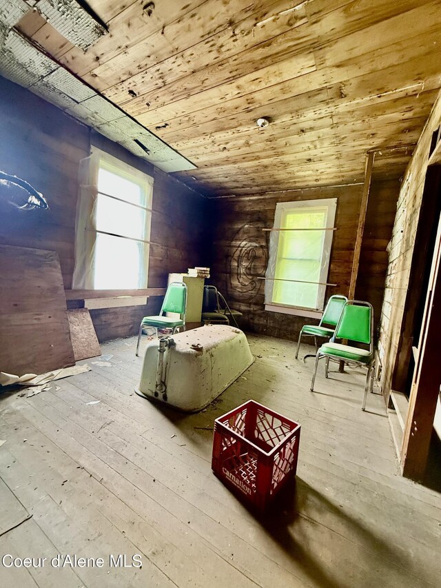 408 High Bank St, Wallace, ID 83873 - living area with wood ceiling, hardwood / wood-style flooring, and wood walls