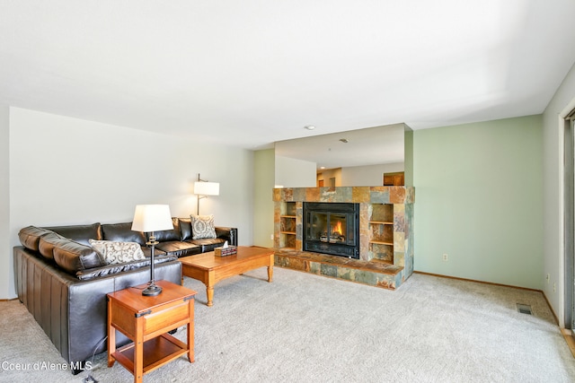 204 E 1st Ave E # 4, Post Falls, ID 83854 - living room featuring carpet flooring and a stone fireplace