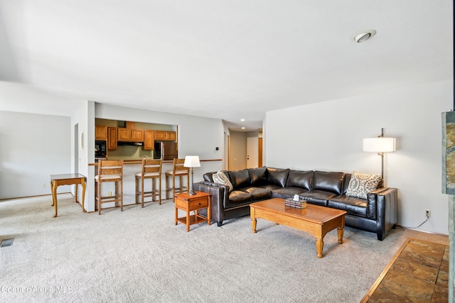 204 E 1st Ave E # 4, Post Falls, ID 83854 - living room featuring light colored carpet and recessed lighting