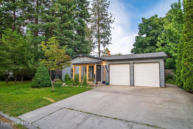 3212 N 7th St, Coeur Dalene, ID 83815 - view of front facade with an attached garage, a front lawn, concrete driveway, and a chimney