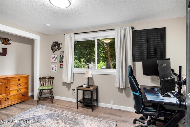 3212 N 7th St, Coeur Dalene, ID 83815 - office area with wood finished floors and a textured ceiling