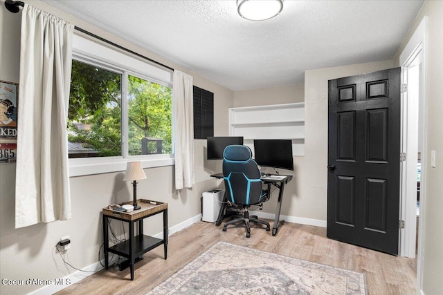 3212 N 7th St, Coeur Dalene, ID 83815 - office space featuring healthy amount of natural light, wood finished floors, and a textured ceiling
