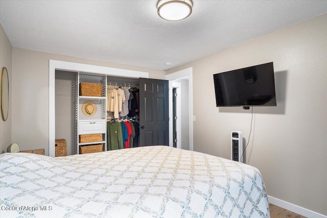 3212 N 7th St, Coeur Dalene, ID 83815 - bedroom featuring a closet and wood finished floors