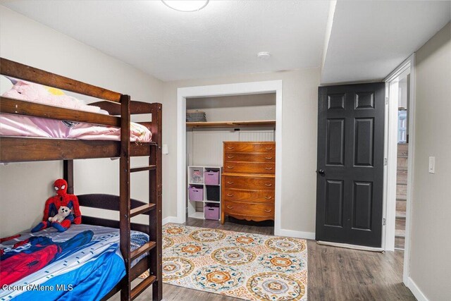 3212 N 7th St, Coeur Dalene, ID 83815 - bedroom featuring wood finished floors and a closet