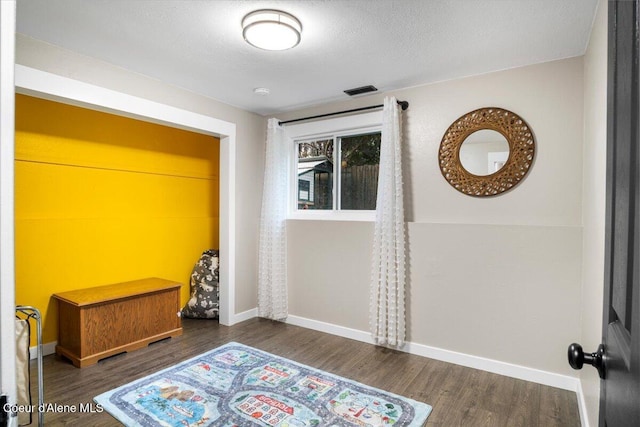 3212 N 7th St, Coeur Dalene, ID 83815 - bedroom featuring wood finished floors and baseboards
