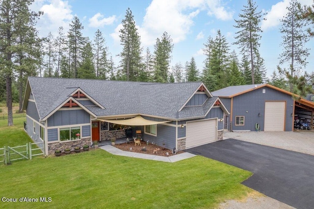 695 W Keva Ln, Athol, ID 83801 - craftsman inspired home with stone siding, board and batten siding, roof with shingles, and driveway