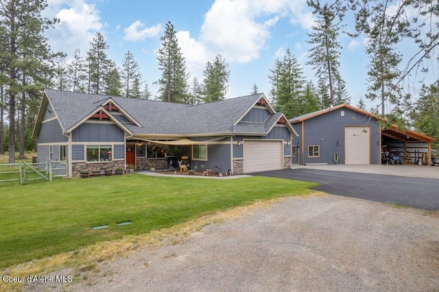 695 W Keva Ln, Athol, ID 83801 - craftsman house with stone siding, board and batten siding, a shingled roof, and asphalt driveway