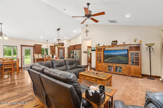695 W Keva Ln, Athol, ID 83801 - living room featuring a ceiling fan, lofted ceiling, light wood-type flooring, and recessed lighting