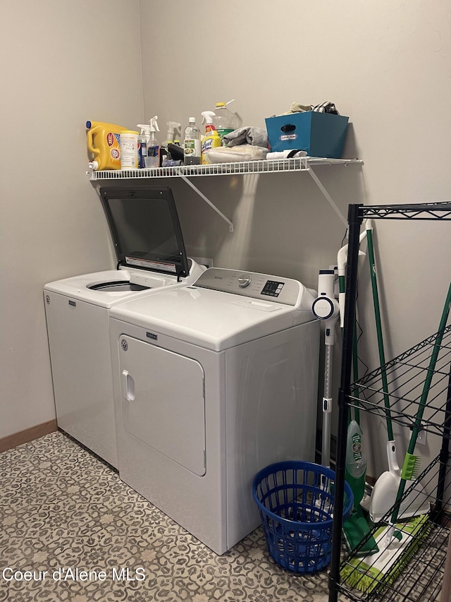 4263 N Donovan Ln, Post Falls, ID 83854 - laundry area with washing machine and dryer and baseboards