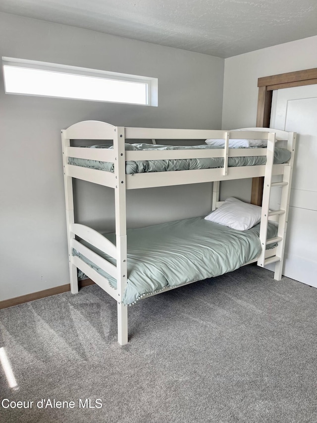 4263 N Donovan Ln, Post Falls, ID 83854 - carpeted bedroom with baseboards