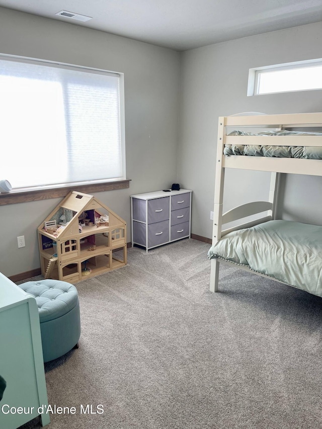 4263 N Donovan Ln, Post Falls, ID 83854 - carpeted bedroom featuring baseboards