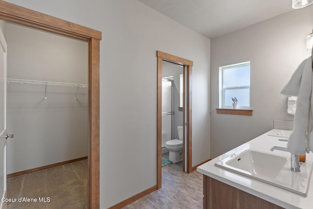 4263 N Donovan Ln, Post Falls, ID 83854 - full bath featuring double vanity and a walk in closet