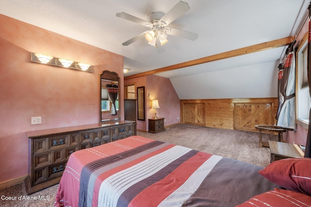 9067 W Coeur D Alene Dr, Spirit Lake, ID 83869 - bedroom featuring carpet floors, wooden walls, and vaulted ceiling