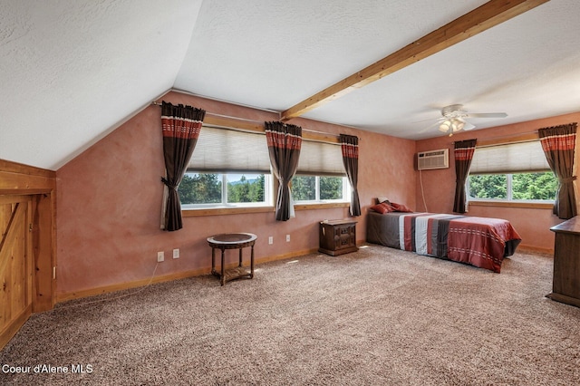 9067 W Coeur D Alene Dr, Spirit Lake, ID 83869 - bedroom featuring multiple windows, carpet flooring, a textured ceiling, and an AC wall unit