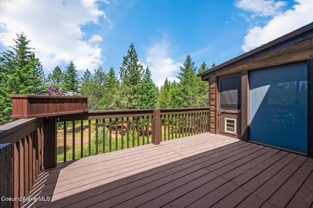 9067 W Coeur D Alene Dr, Spirit Lake, ID 83869 - view of wooden terrace