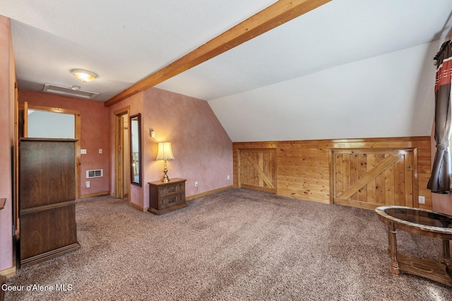 9067 W Coeur D Alene Dr, Spirit Lake, ID 83869 - additional living space with carpet floors, wooden walls, and lofted ceiling