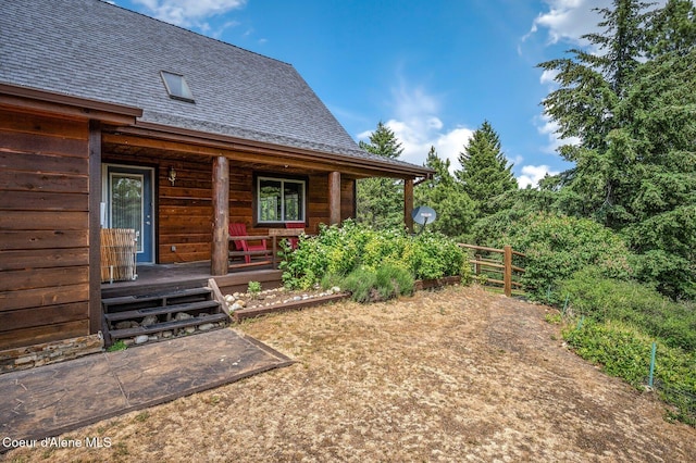 9067 W Coeur D Alene Dr, Spirit Lake, ID 83869 - view of yard featuring a porch