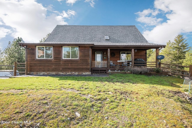 9067 W Coeur D Alene Dr, Spirit Lake, ID 83869 - view of front facade with covered porch and roof with shingles