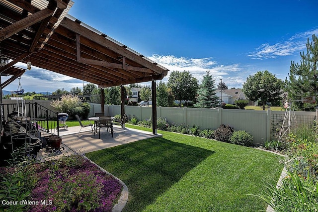 2052 W Bernard Dr, Coeur Dalene, ID 83815 - fenced backyard with a patio area
