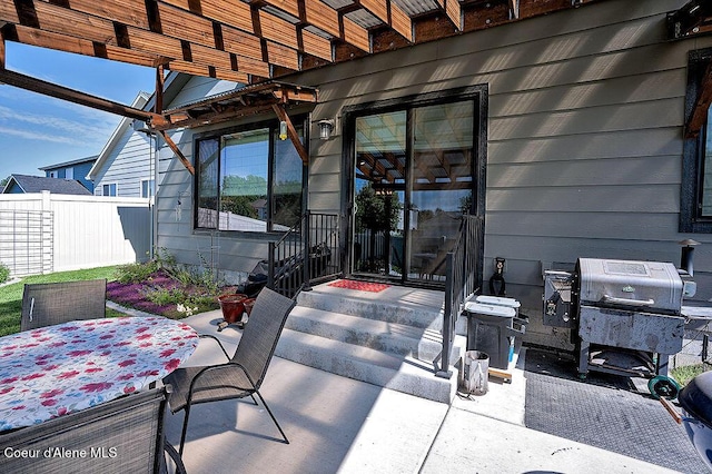 2052 W Bernard Dr, Coeur Dalene, ID 83815 - view of patio with outdoor dining space and a grill