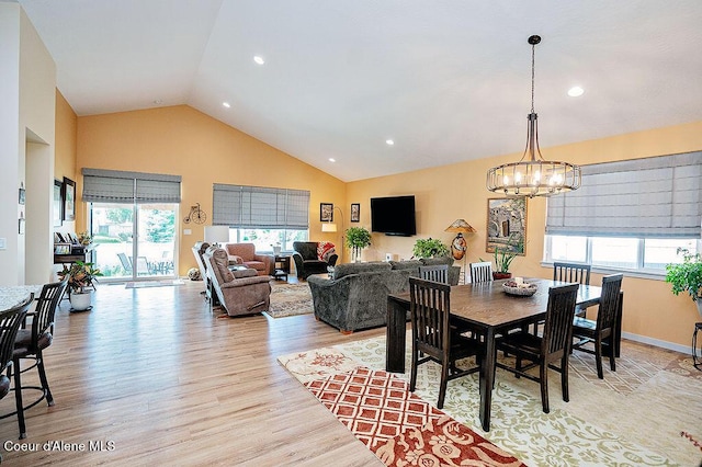 2052 W Bernard Dr, Coeur Dalene, ID 83815 - dining space with a chandelier, light wood-style floors, high vaulted ceiling, and recessed lighting