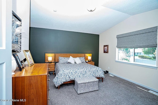 2052 W Bernard Dr, Coeur Dalene, ID 83815 - carpeted bedroom featuring lofted ceiling and a textured ceiling