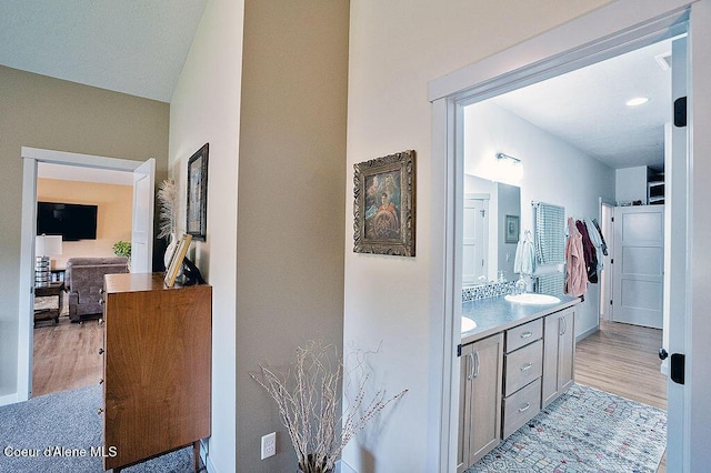 2052 W Bernard Dr, Coeur Dalene, ID 83815 - bathroom with double vanity and wood finished floors