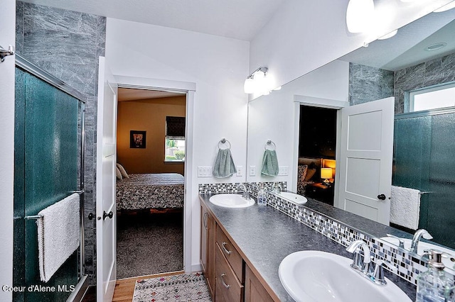 2052 W Bernard Dr, Coeur Dalene, ID 83815 - full bathroom with ensuite bath, double vanity, and a shower stall