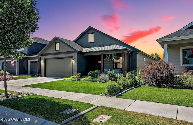 2052 W Bernard Dr, Coeur Dalene, ID 83815 - view of front of home with an attached garage, a lawn, and driveway