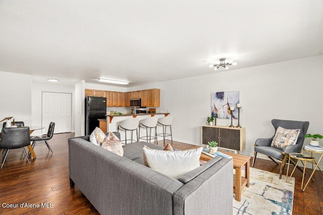 310 N Promenade Loop # 210, Post Falls, ID 83854 - living area featuring hardwood / wood-style floors