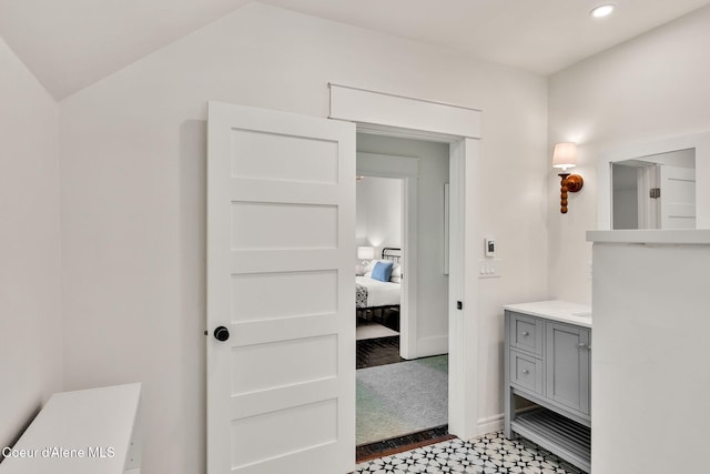 917 N Boyer Ave, Sandpoint, ID 83864 - bathroom featuring vanity, ensuite bath, recessed lighting, and lofted ceiling
