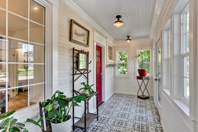917 N Boyer Ave, Sandpoint, ID 83864 - sunroom featuring plenty of natural light, tile patterned floors, and crown molding